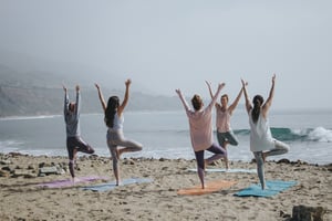 woman at outdoor yoga class