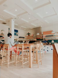 man working in coffee shop