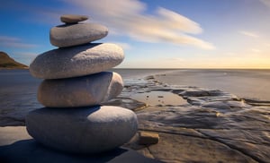 stacked stones by water