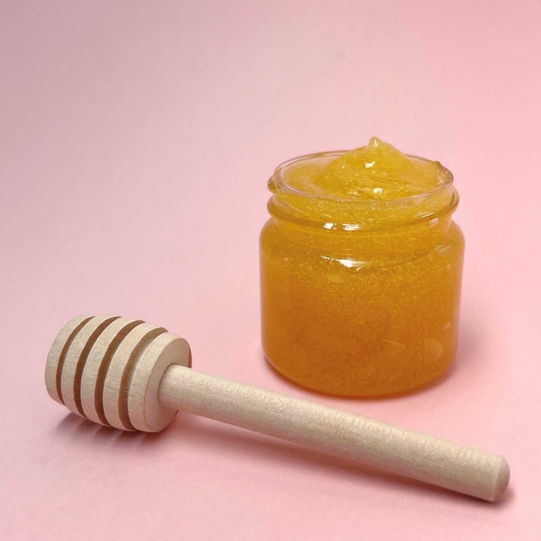 Twincraft product - honey mask, shown in jar with honey dipper in front of it