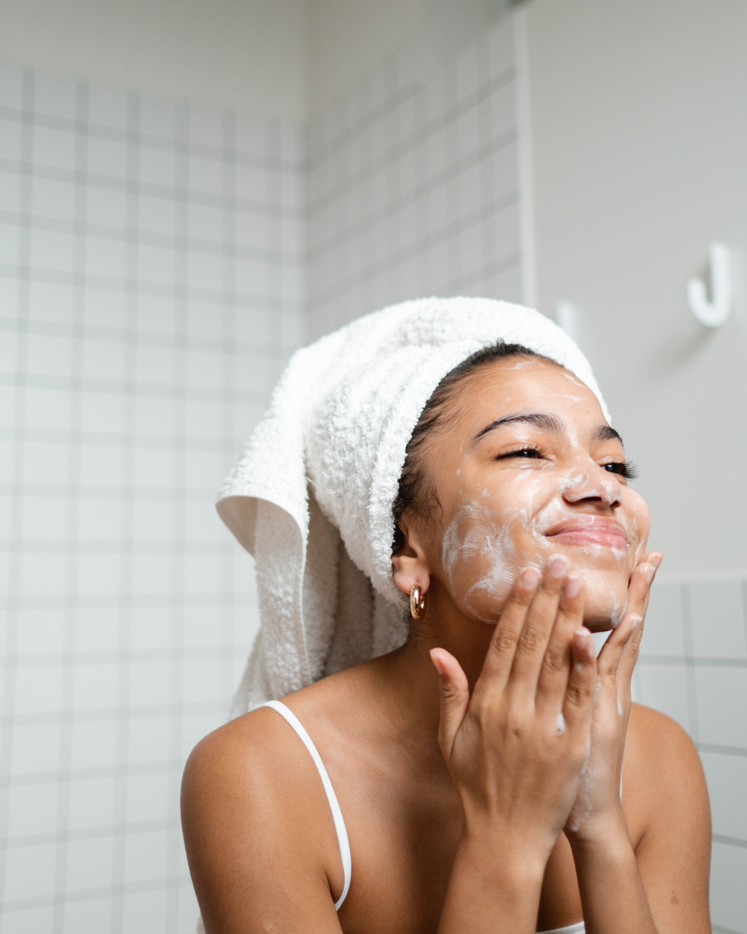 Girl washing her face
