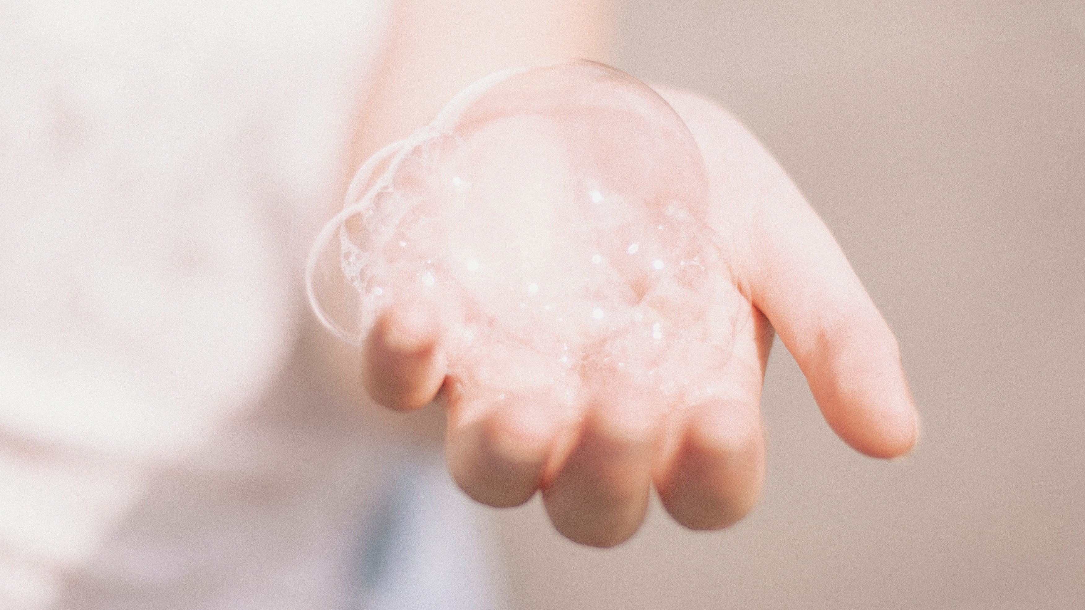 hand holding bubbles