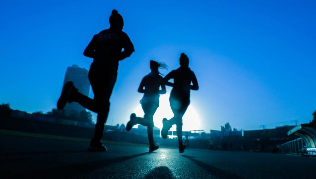 women-running-at-night
